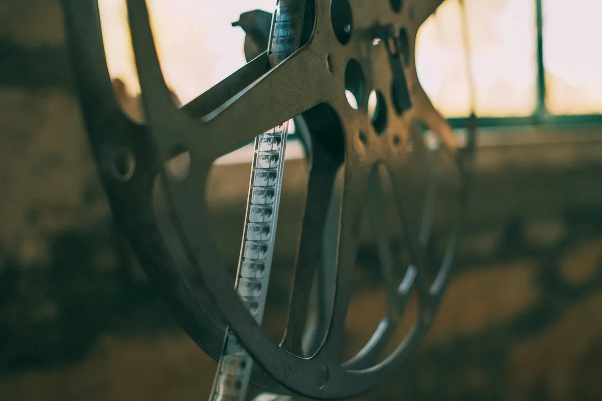 A contemplative cinema setting with documentary film projection