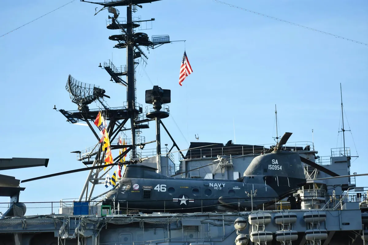A US Navy aircraft carrier on calm Pacific waters